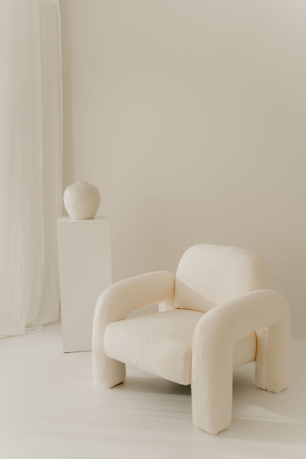 Landloft Studio - Sculptural armchair with ceramic vase