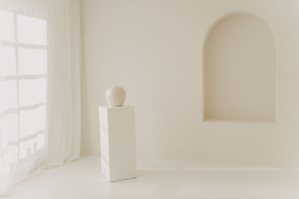 Landloft Studio - White pedestal with ceramic vase and arched niche